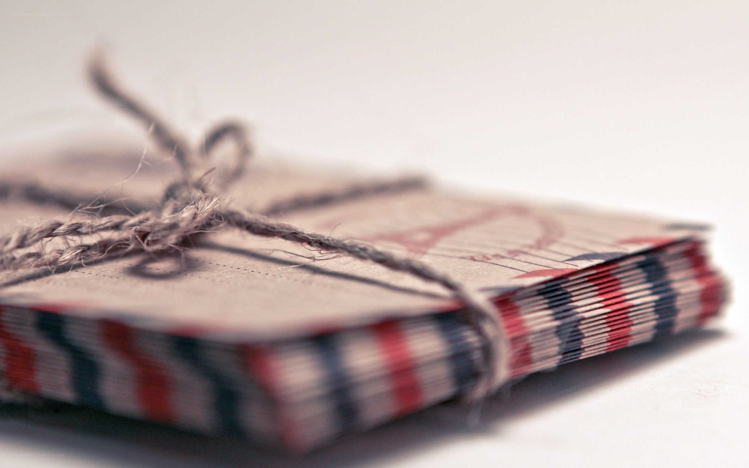 stacked cards tied with twine