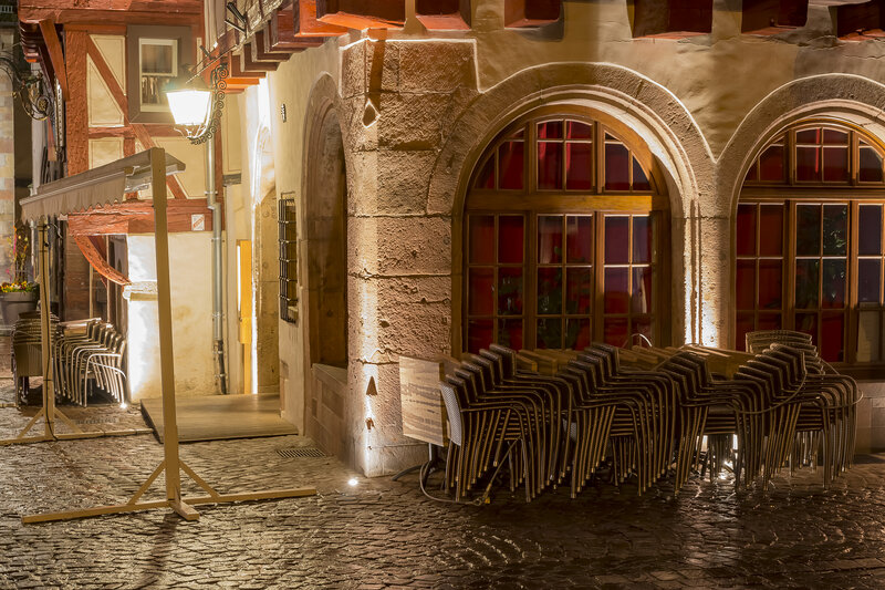 Stacked Chairs Outside Restaurant