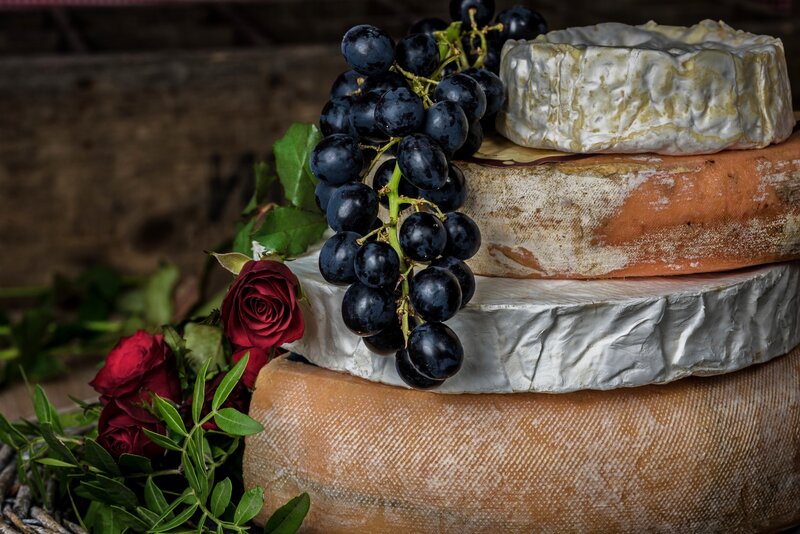 Stacked Cheese Wheels — Brown