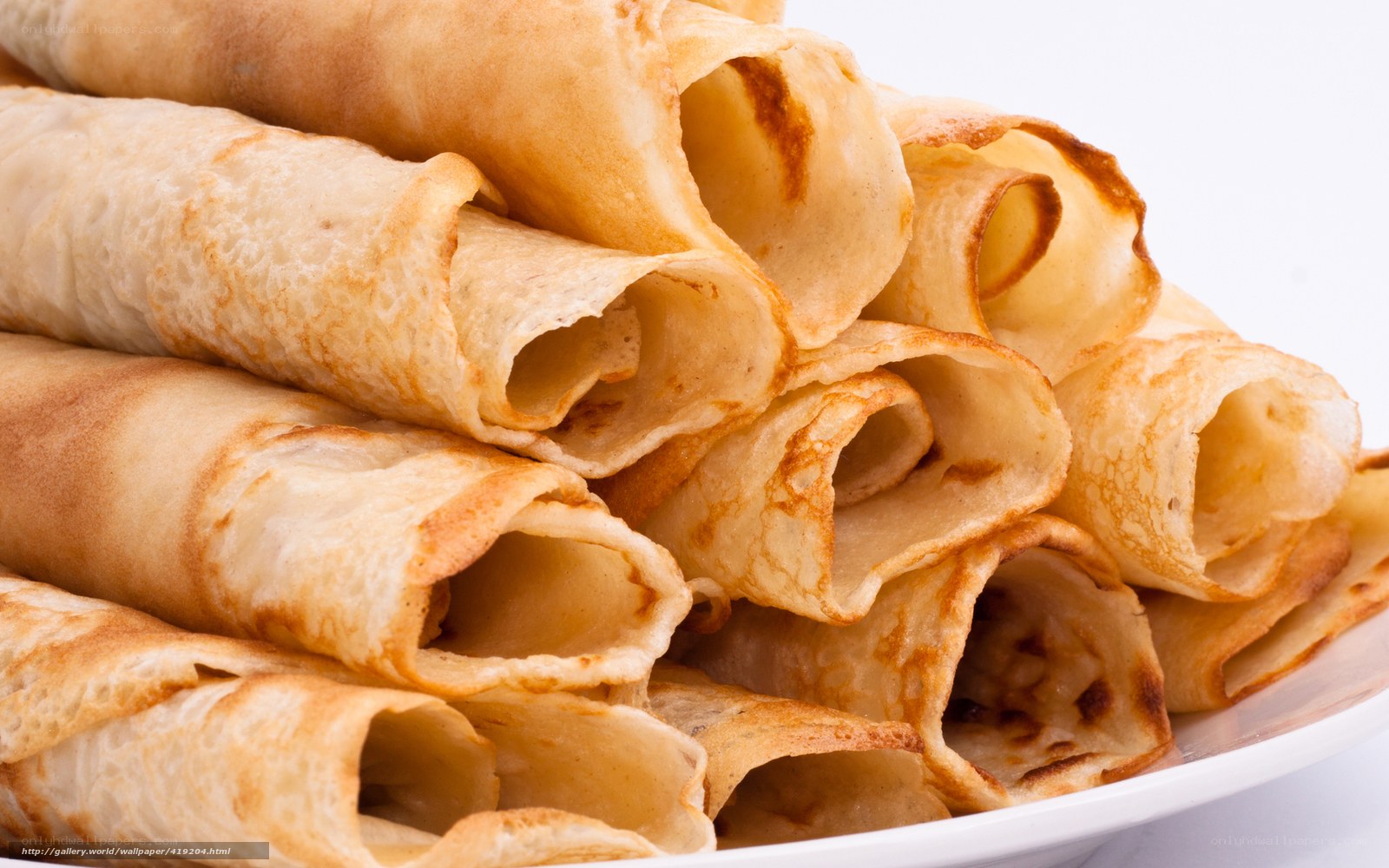 stacked crepes on a plate