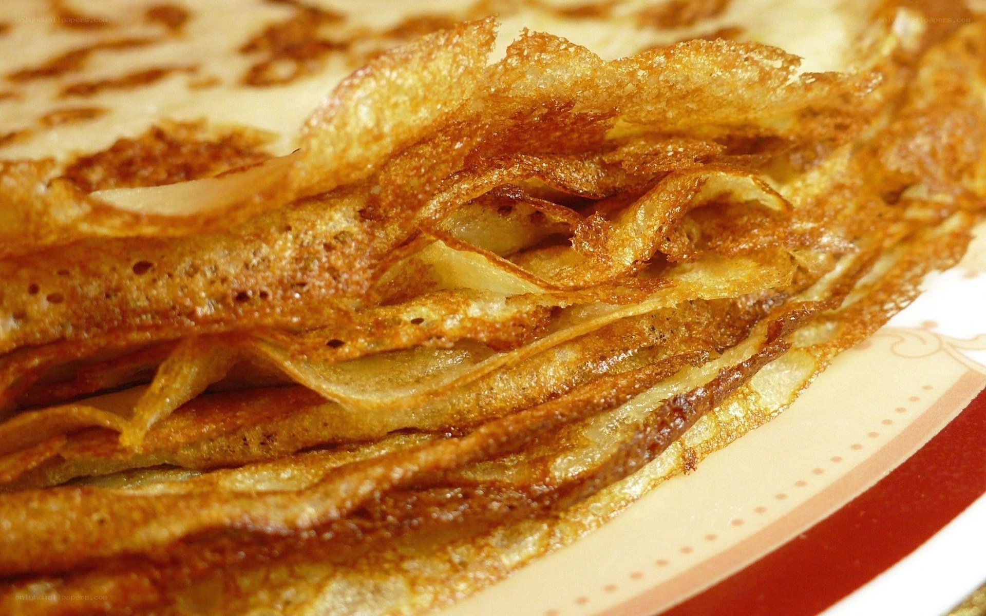 stacked crepes on plate
