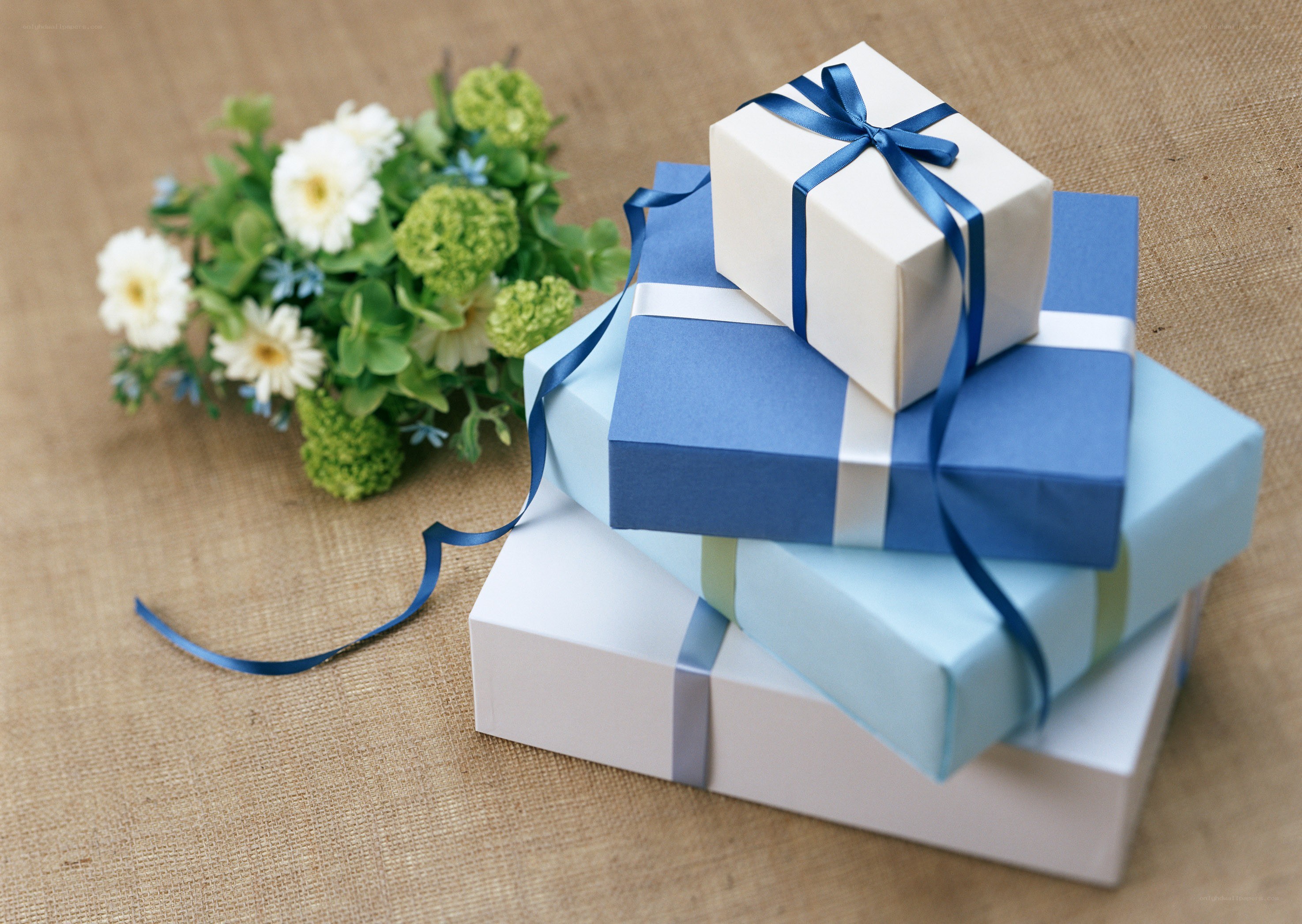 stacked gift boxes with flowers