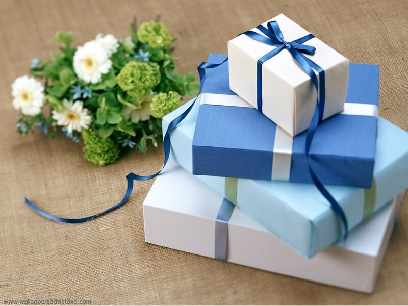 stacked gift boxes with flowers