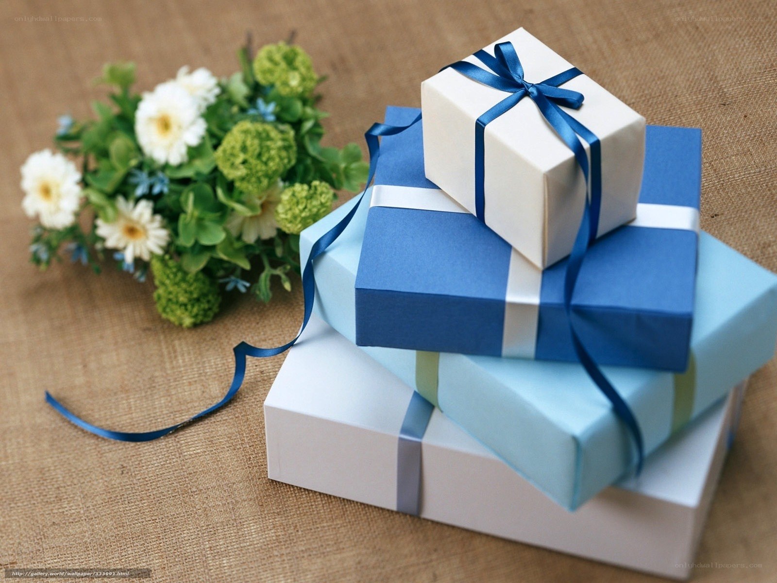 stacked gift boxes with flowers