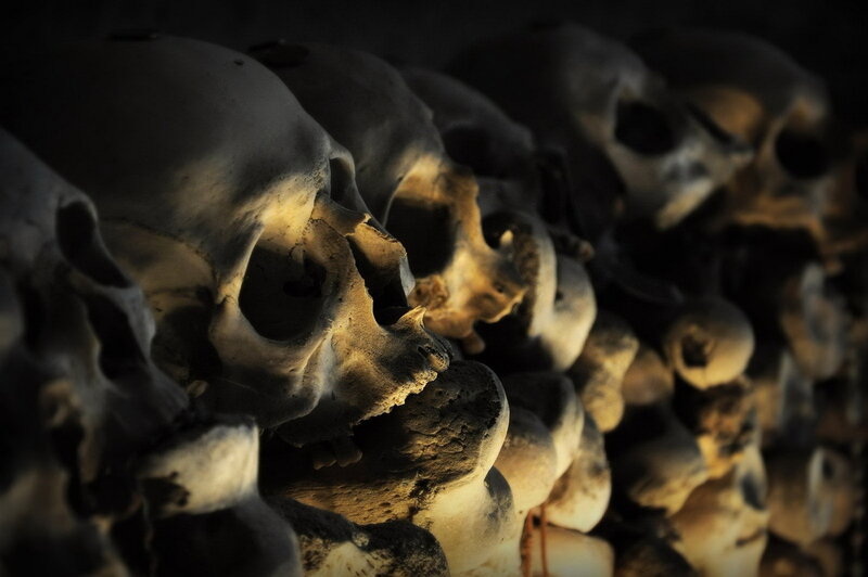 Stacked Human Skulls — Black
