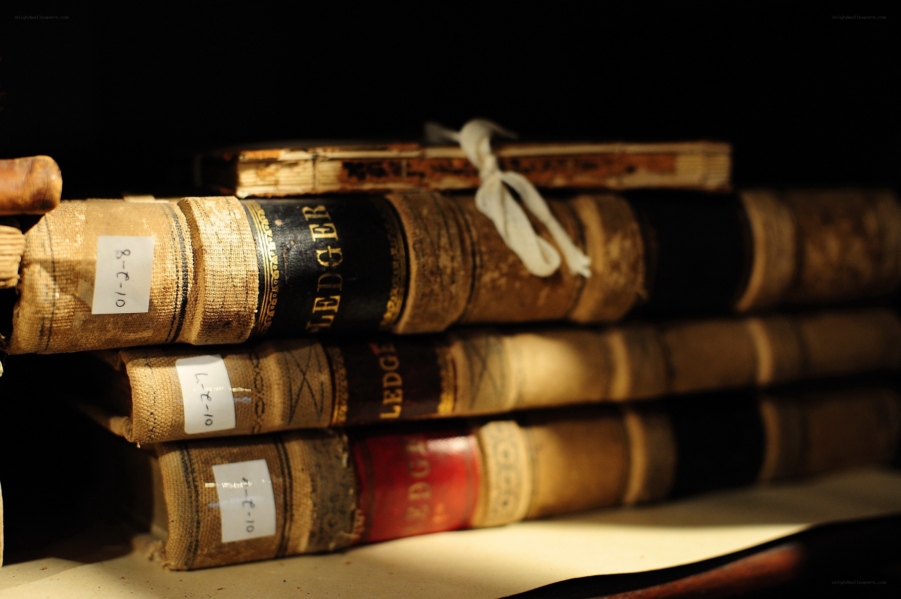 stacked old ledgers