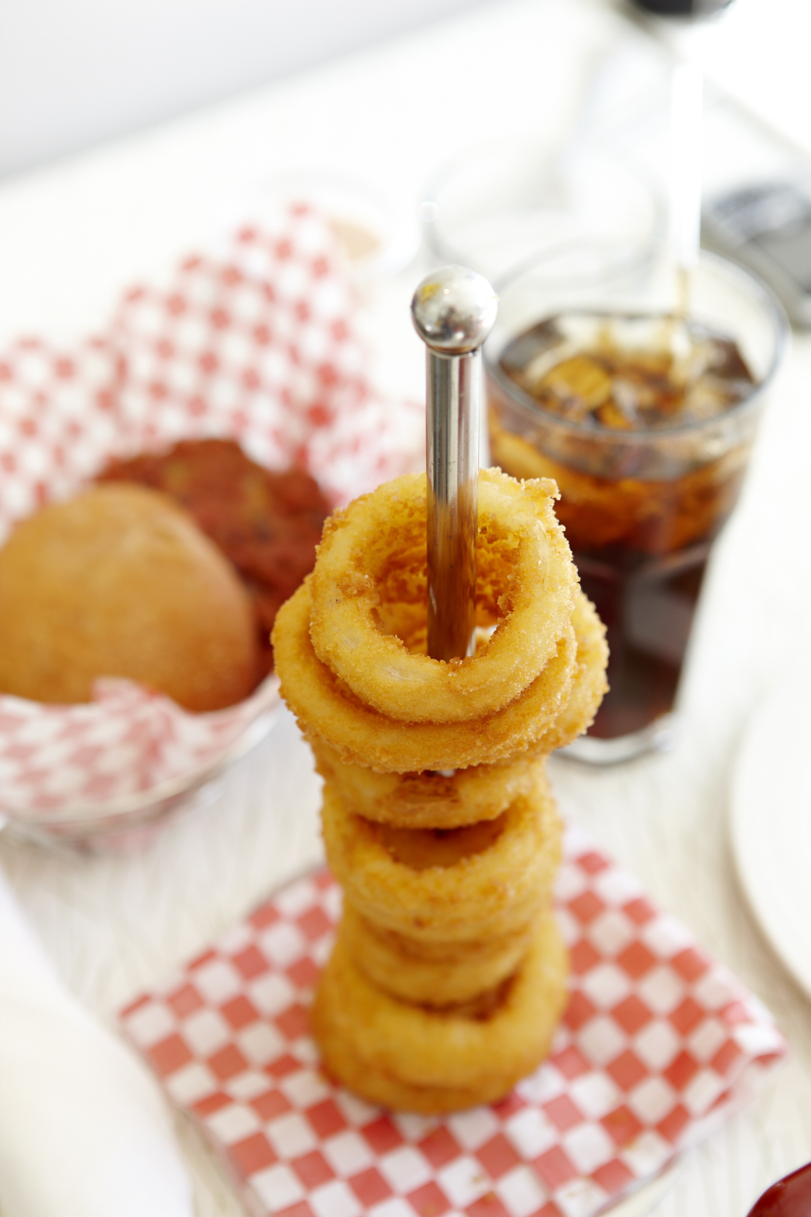 stacked onion rings with drink
