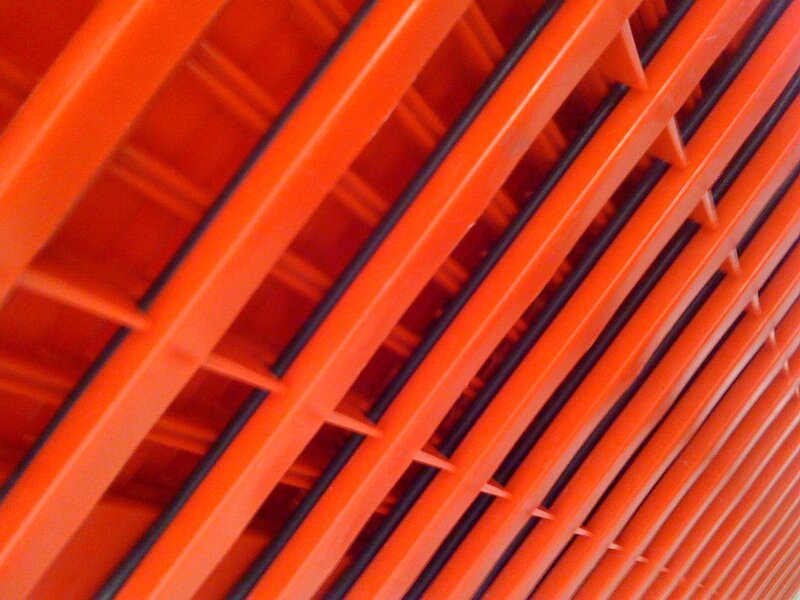 stacked orange plastic crates