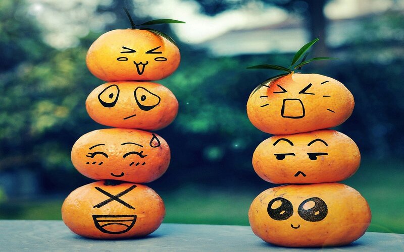 Stacked Oranges with Faces — Orange, Playful