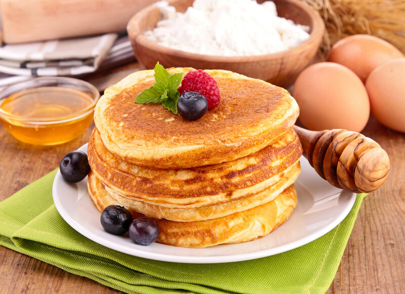stacked pancakes with berries