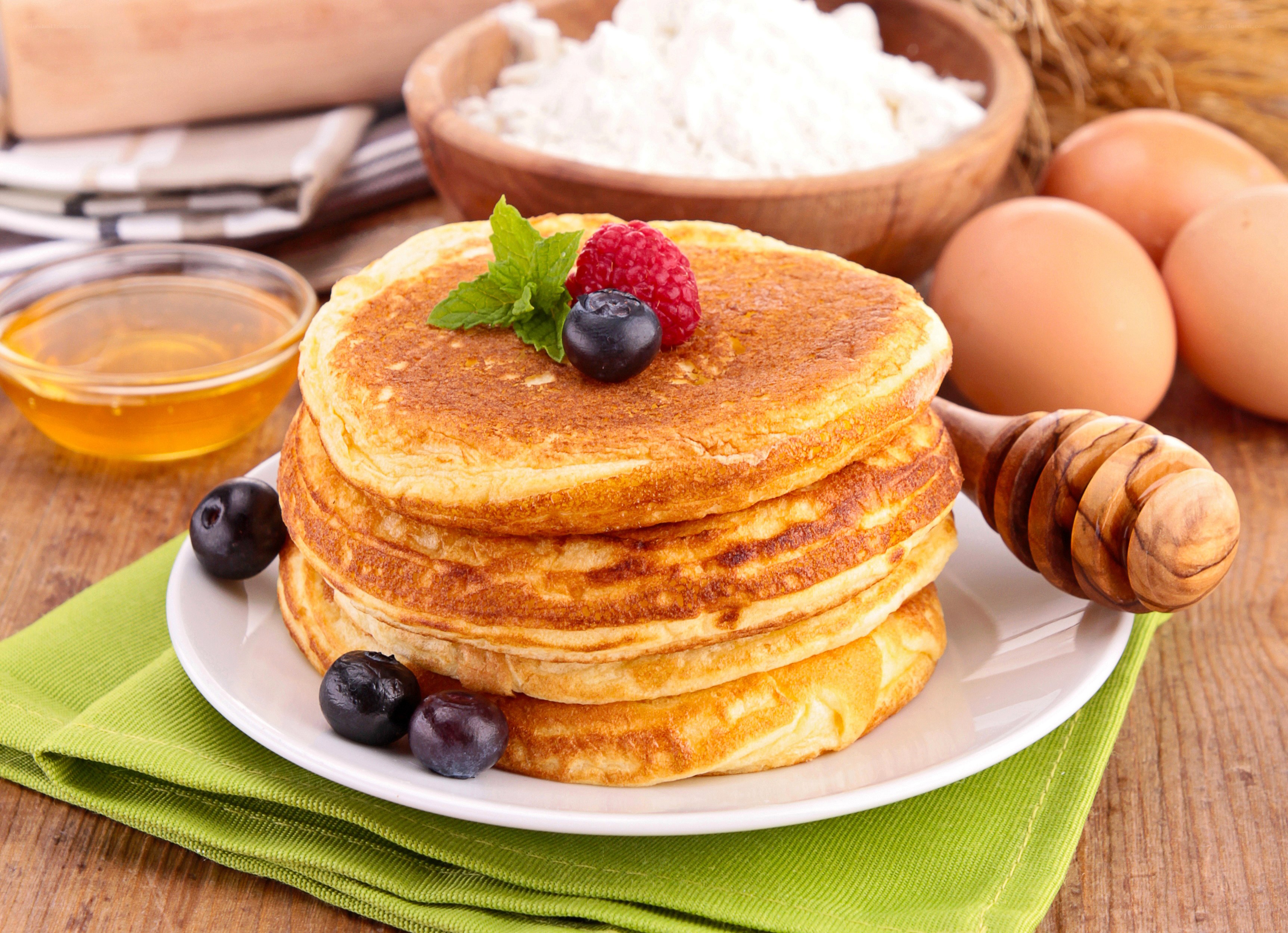 stacked pancakes with berries