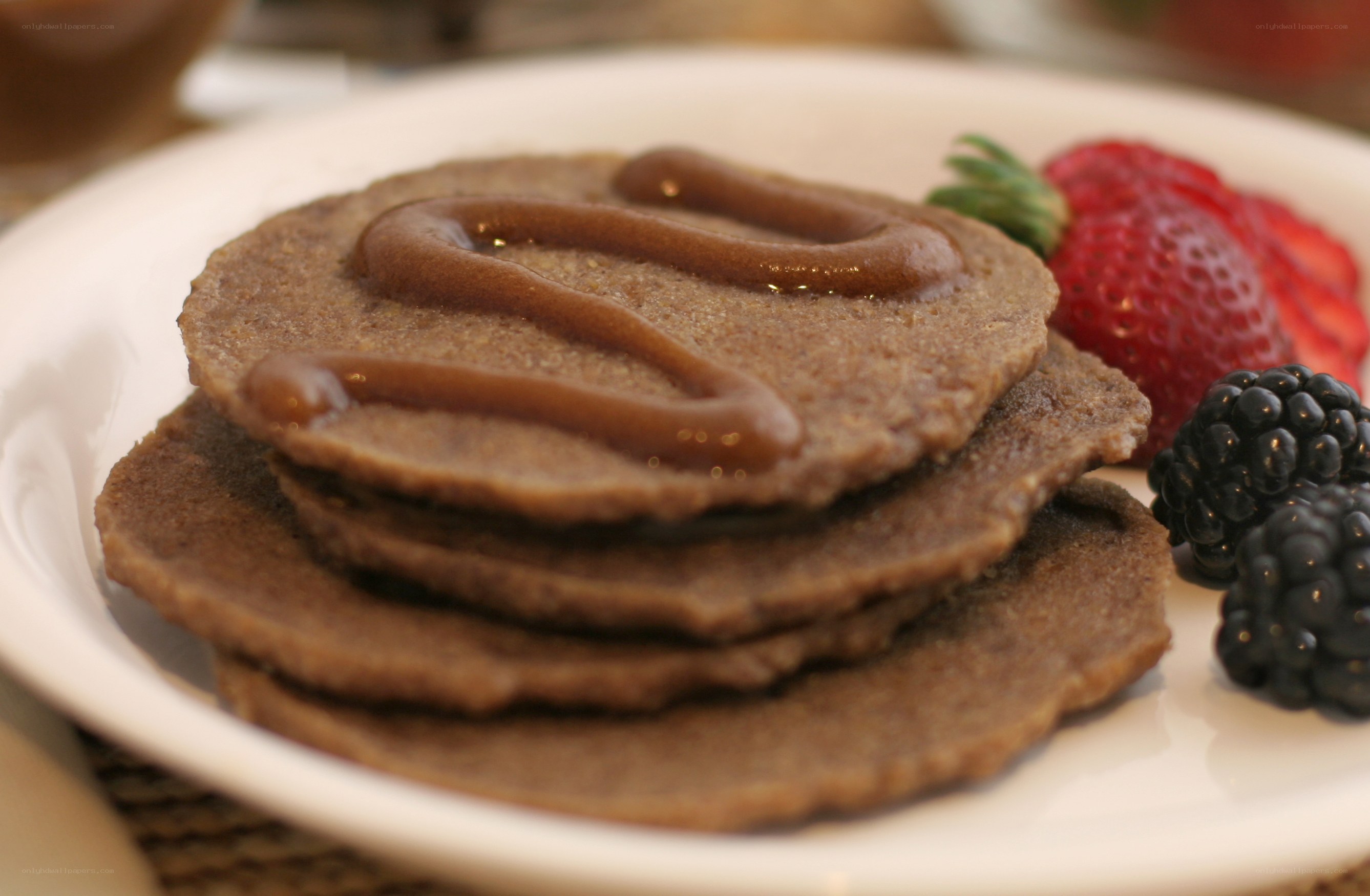 stacked pancakes with berries