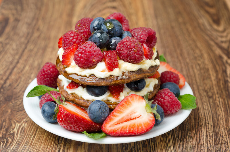 Stacked Pancakes with Berries — Brown