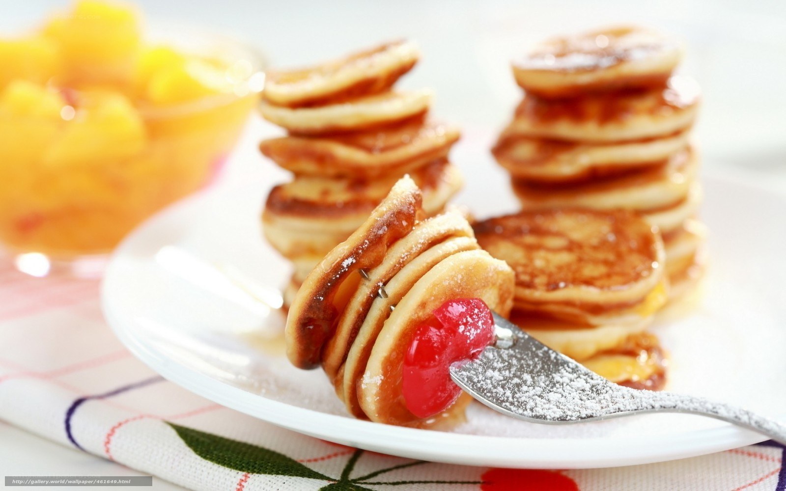 Stacked pancakes with fruit