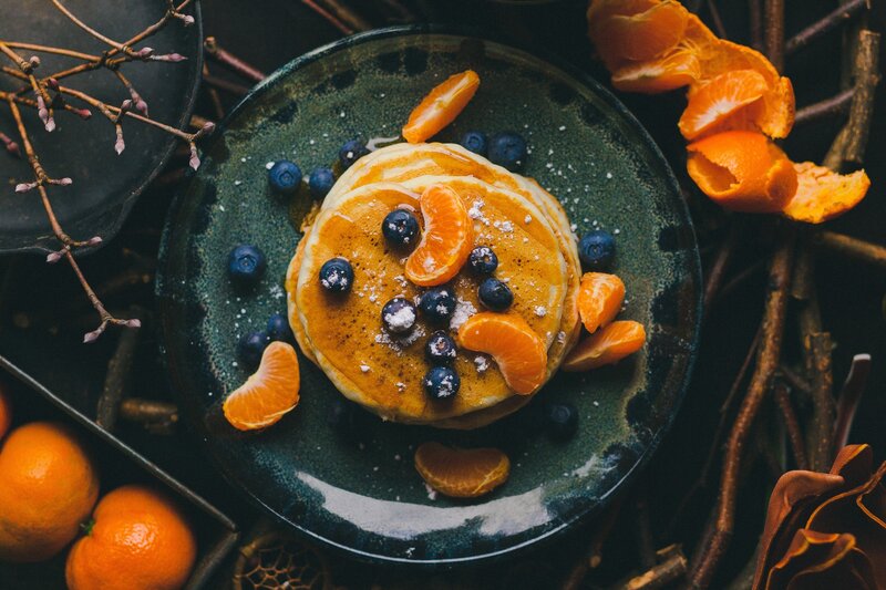 Stacked Pancakes with Fruit — Orange