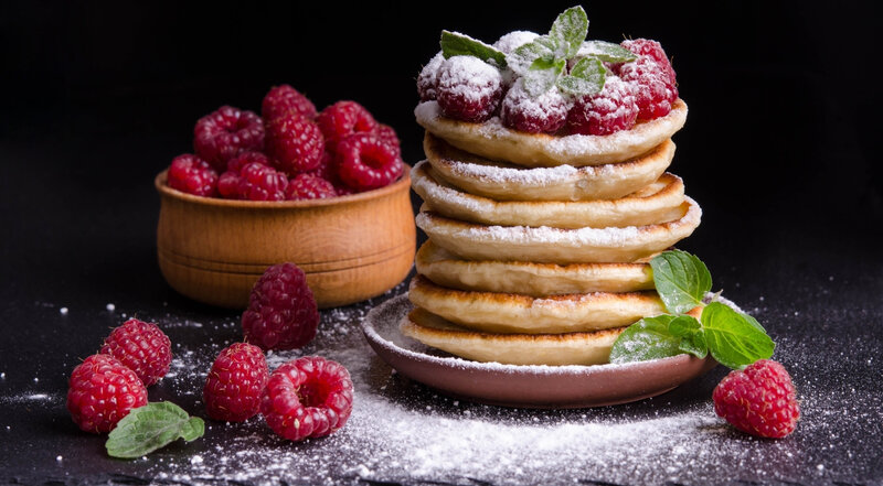 Stacked Pancakes with Raspberries — Black