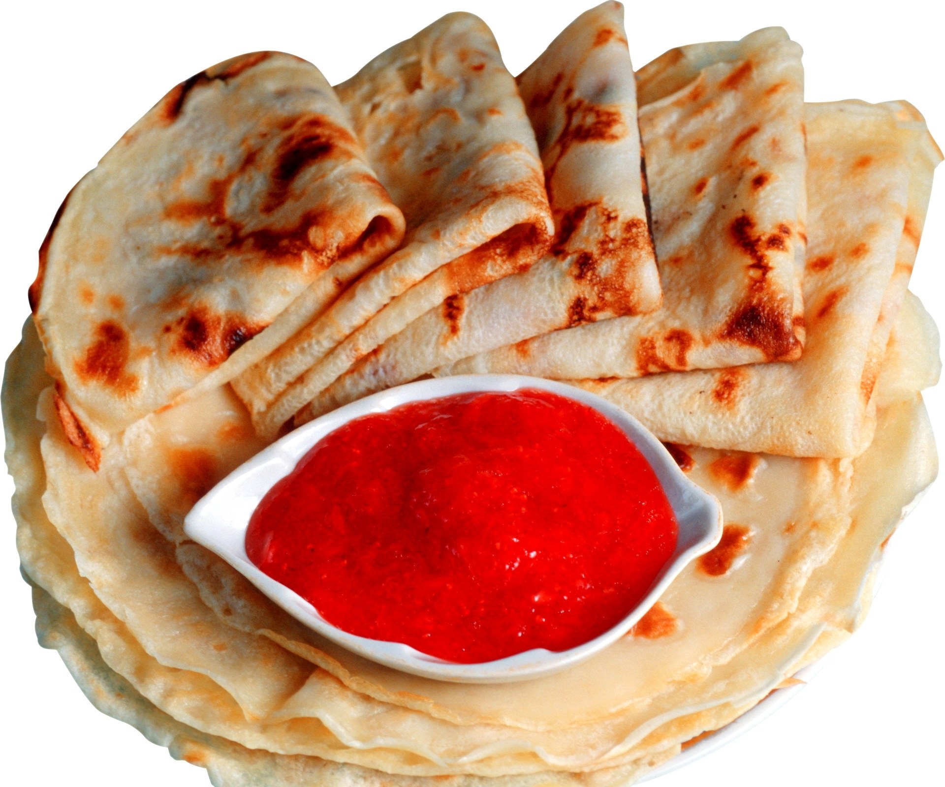 Stacked pancakes with red sauce