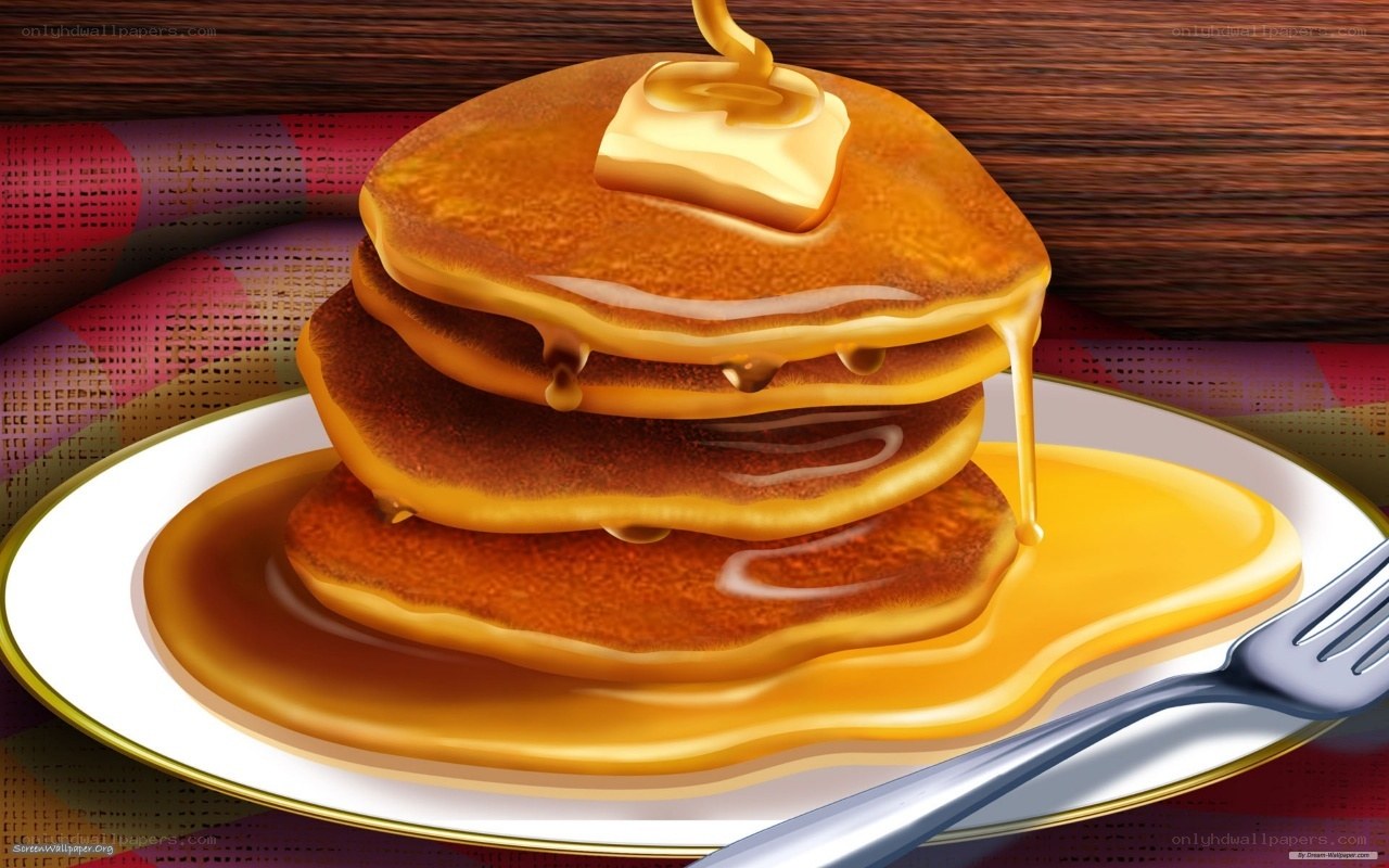 stacked pancakes with syrup