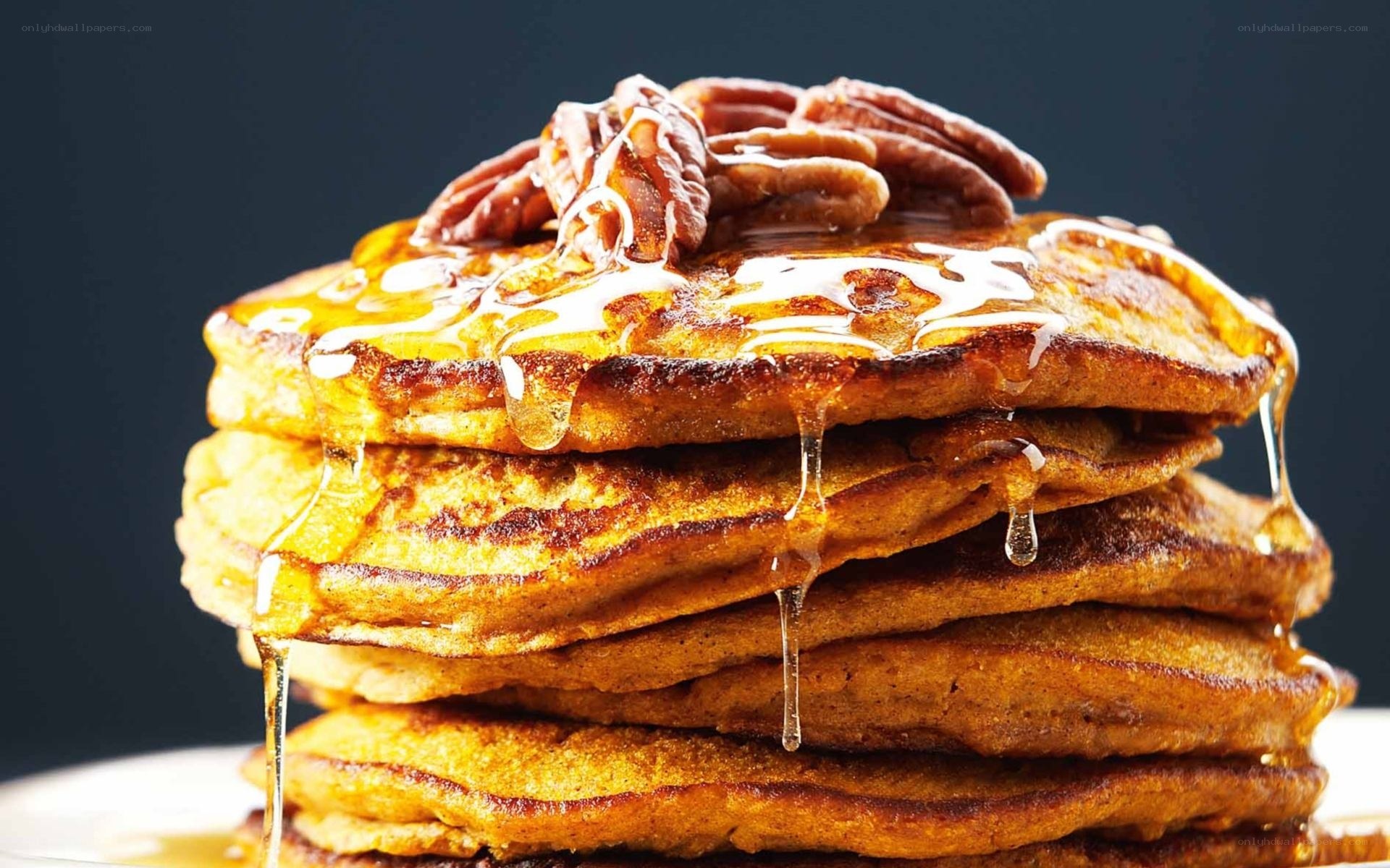 stacked pancakes with syrup