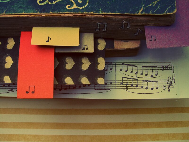 Stacked Papers with Music Notes