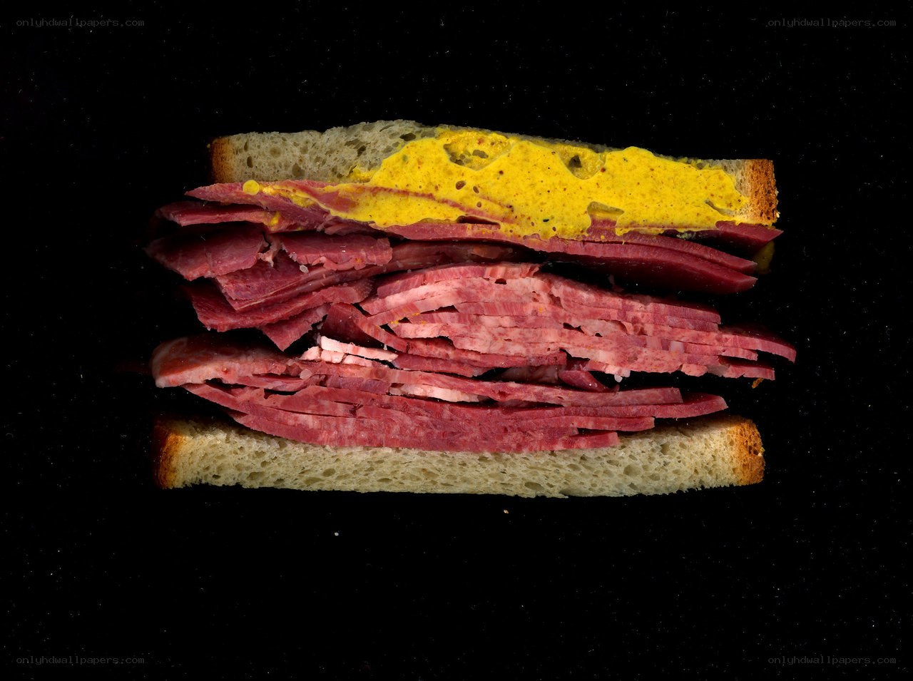 stacked pastrami sandwich