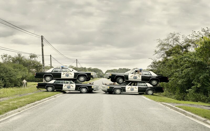 Stacked Police Cars — Gray, Dramatic, Afternoon, Photograph
