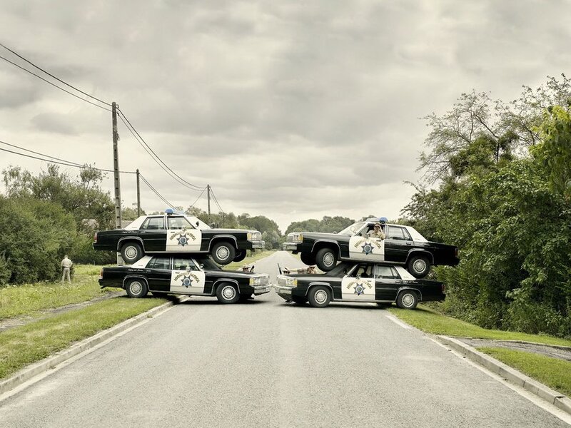 Stacked Police Cars — Gray