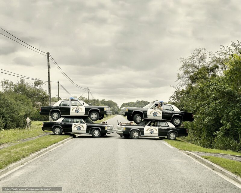 stacked police cars on road