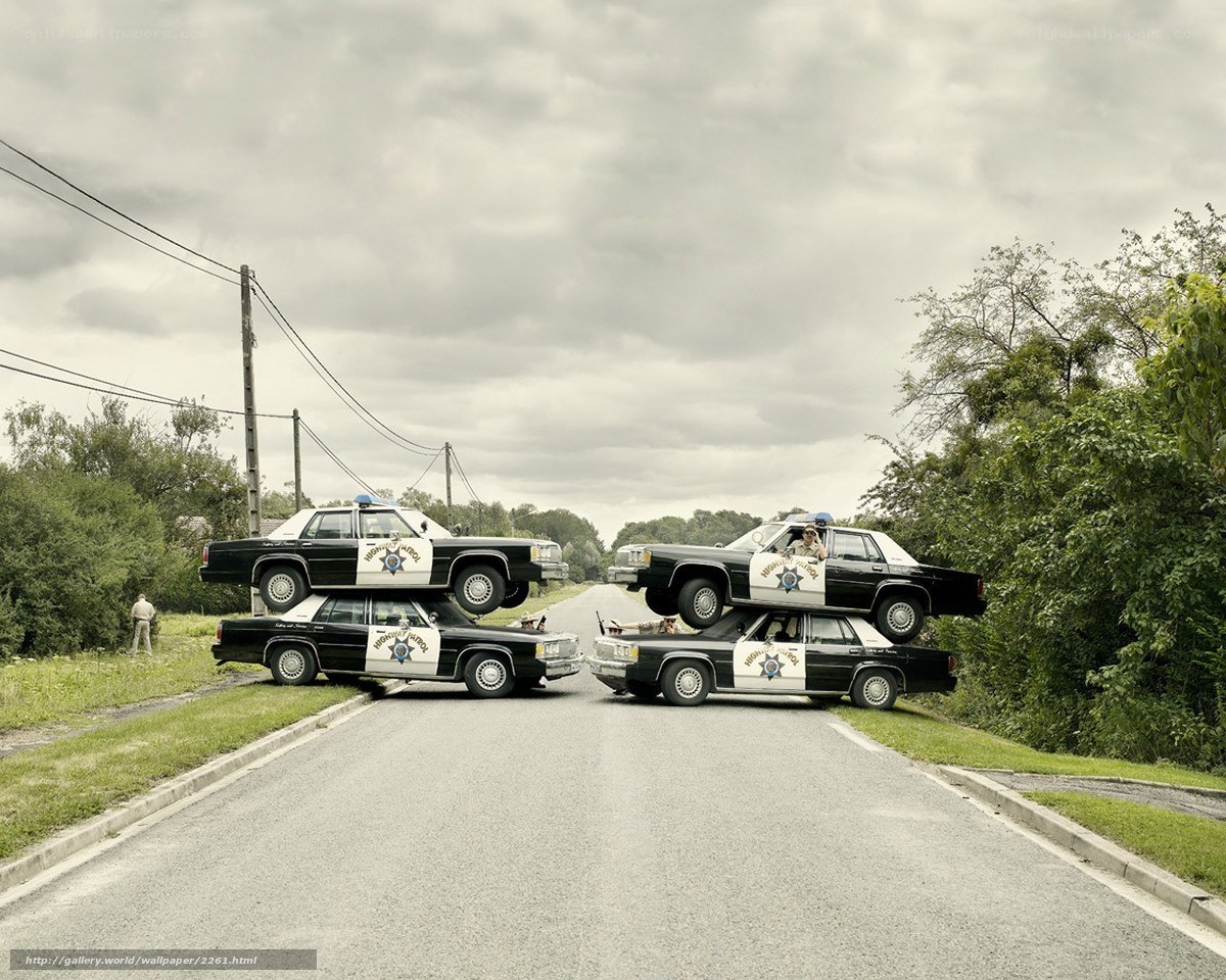 stacked police cars on road