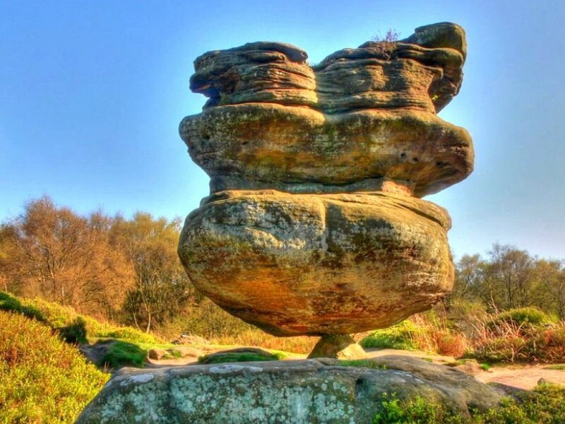 Stacked rock formation in a field