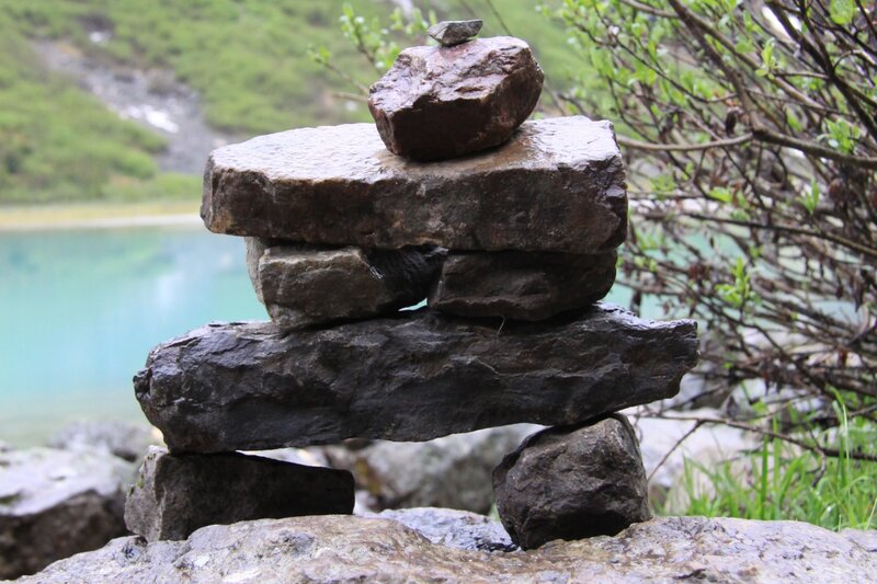 Stacked Rocks by Lake