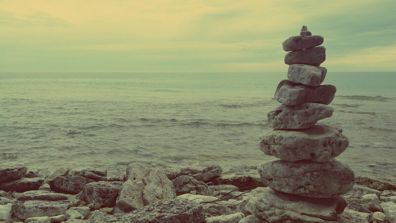 Stacked Rocks on Beach — Green