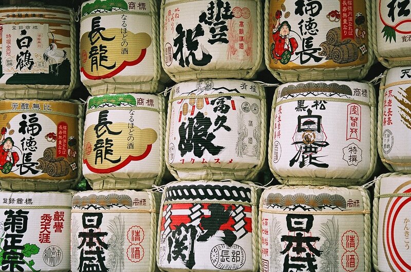 Stacked sake barrels at a festival