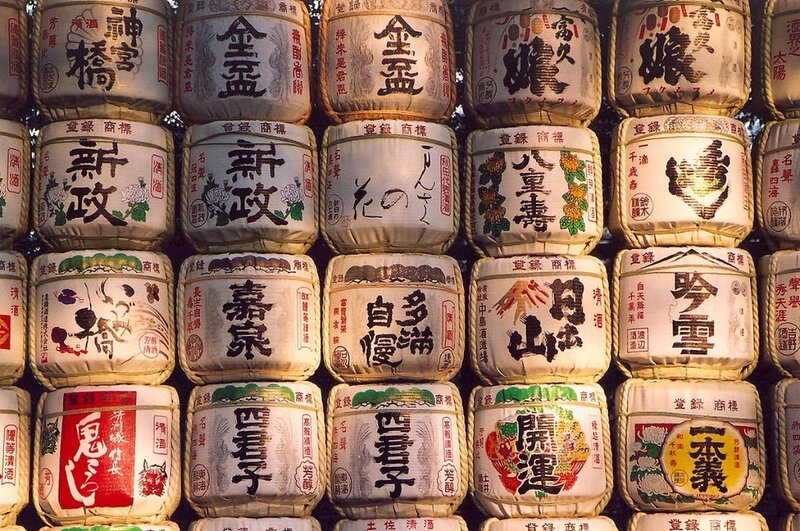 Stacked sake barrels at a shrine
