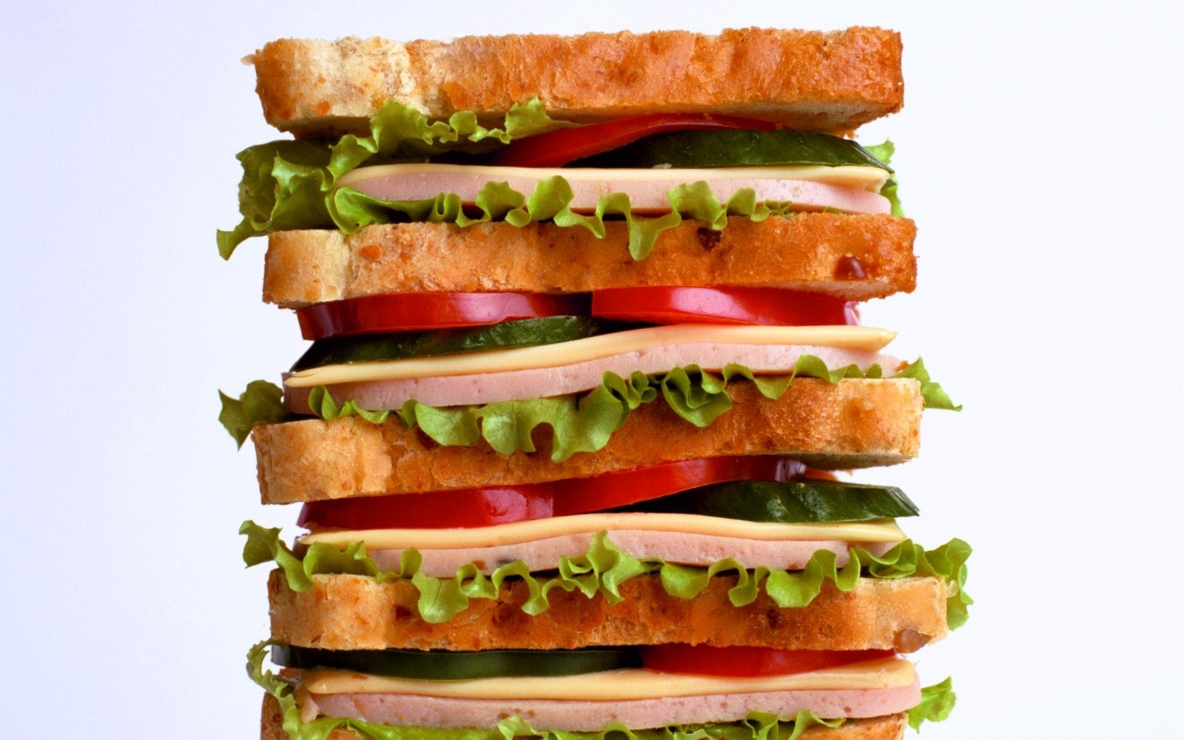 stacked sandwich with ham and vegetables