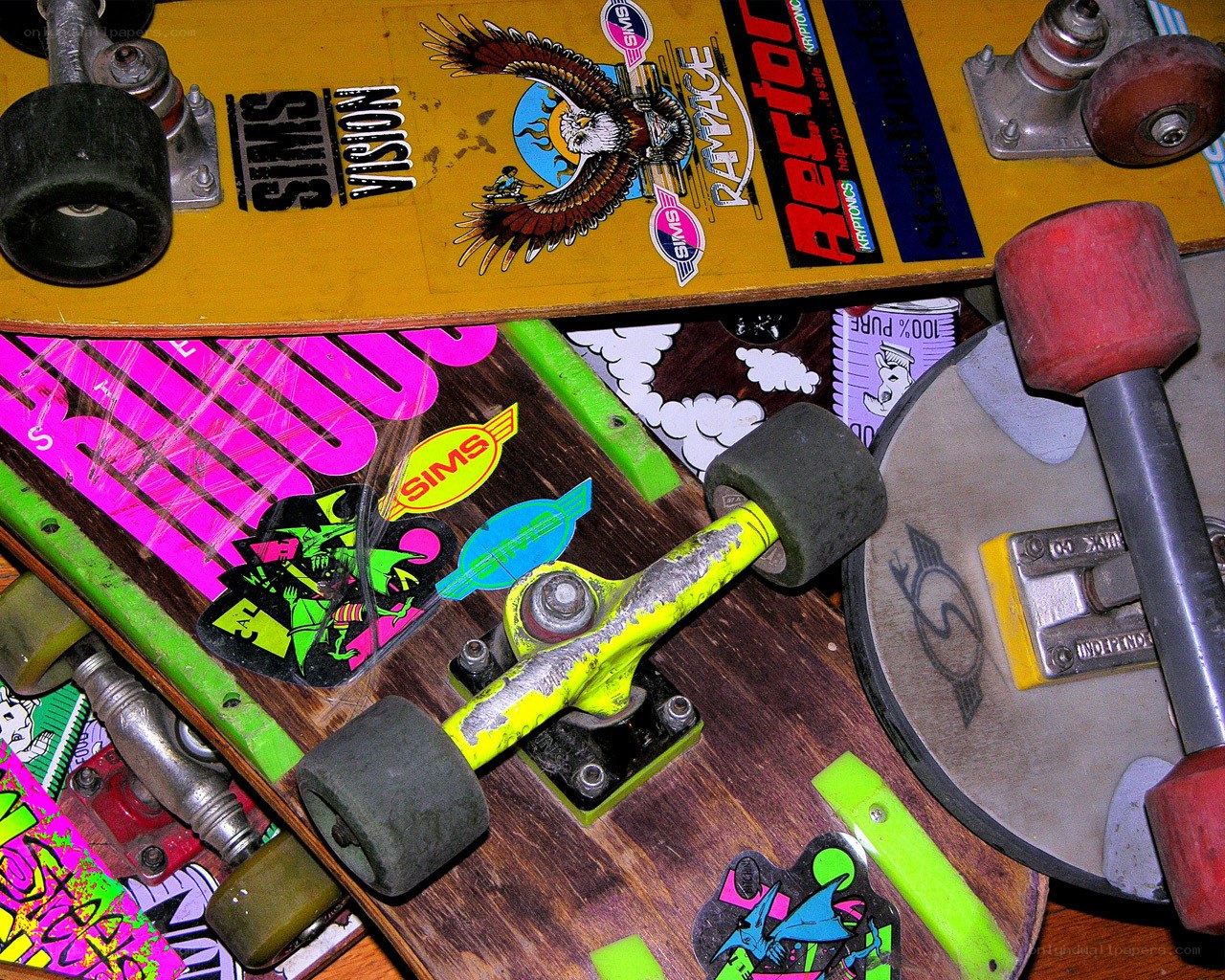 stacked skateboards with stickers