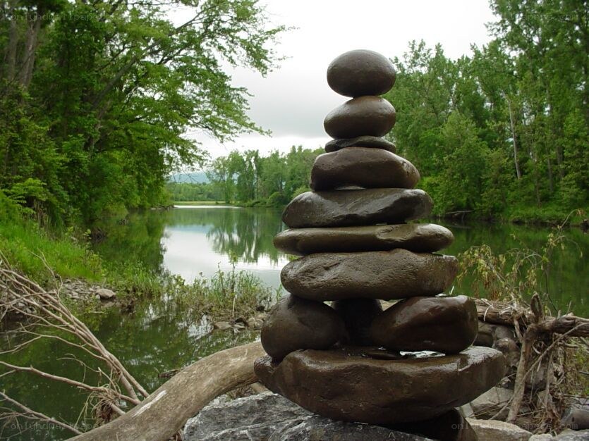 Stacked stones by a river