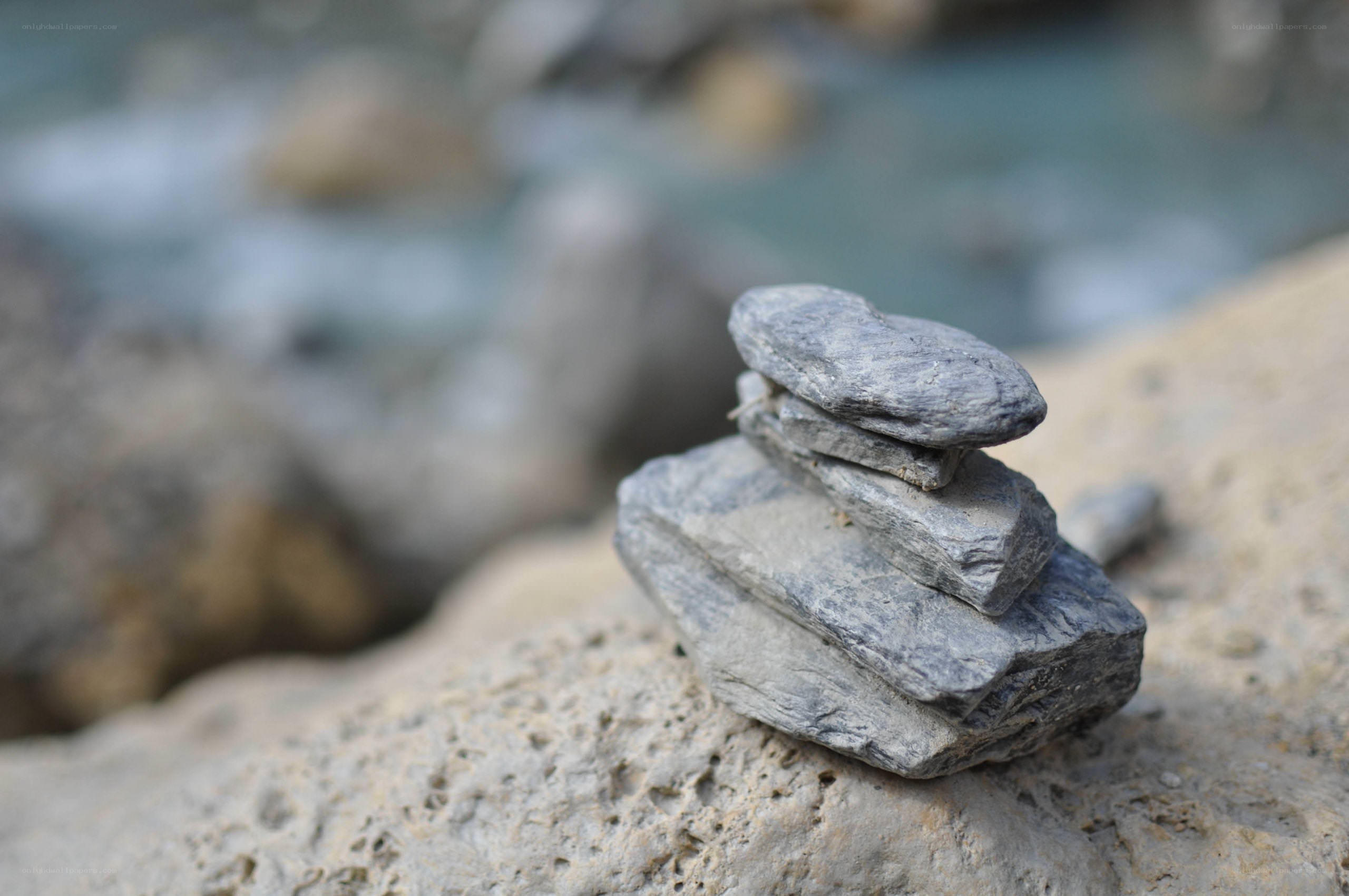 stacked stones by the river