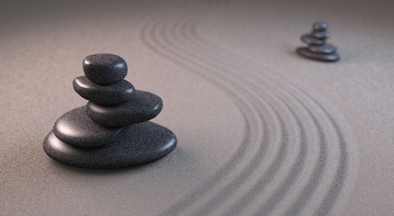 Stacked Stones in Sand — Gray