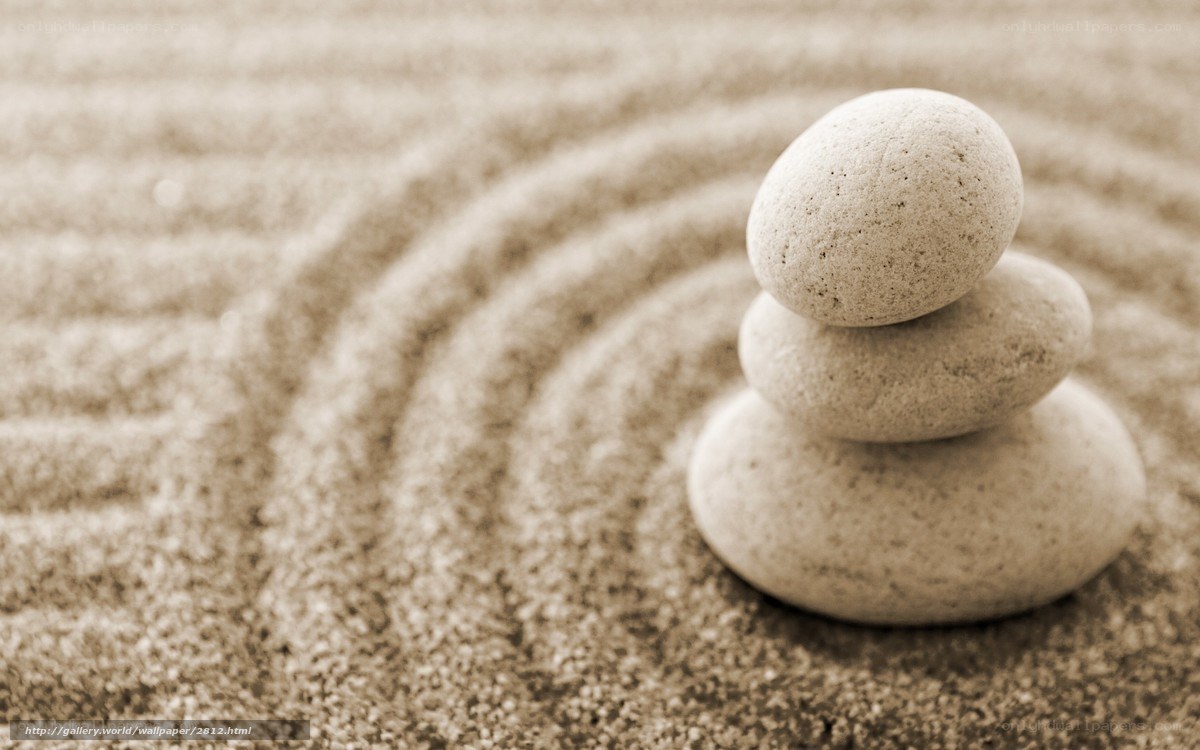 Stacked stones in sand