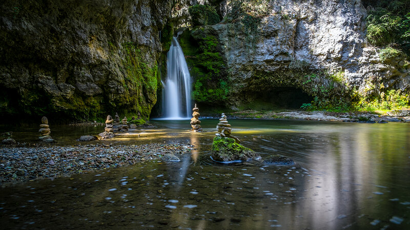 Stacked Stones in Stream — Green