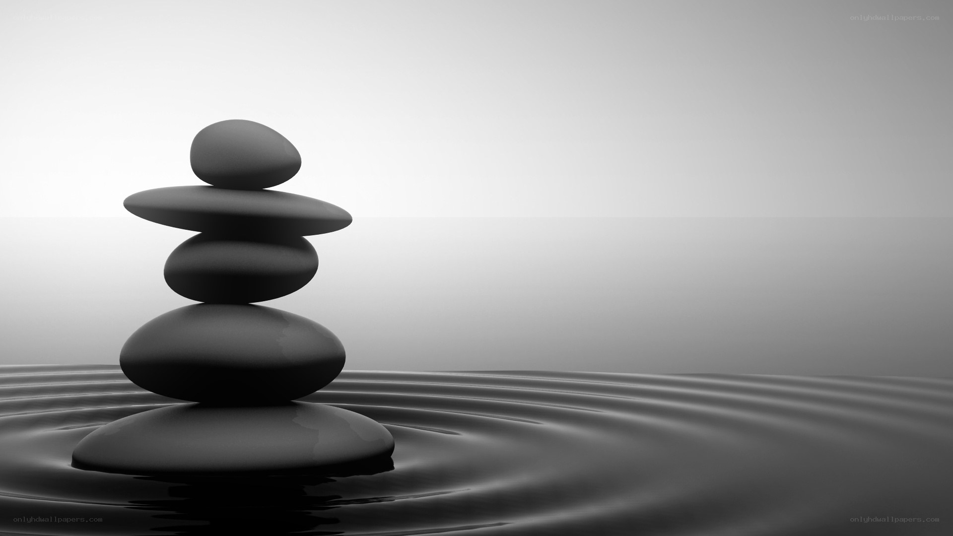 Stacked stones in water