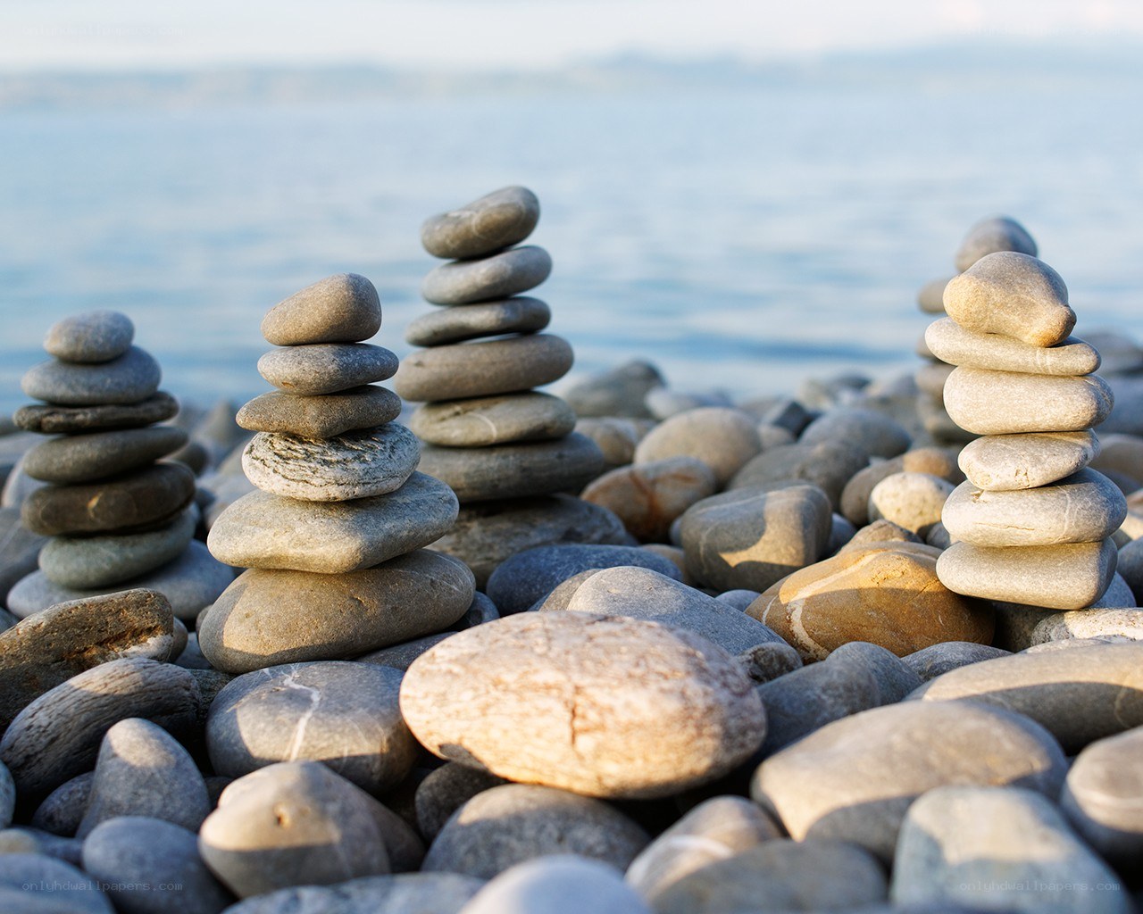 Stacked stones on a beach