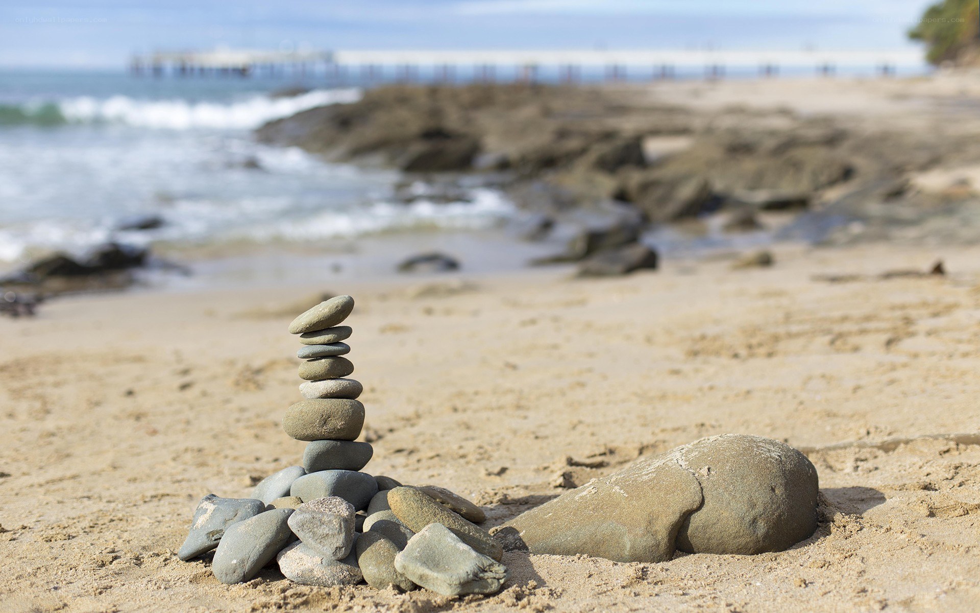Stacked stones on a beach