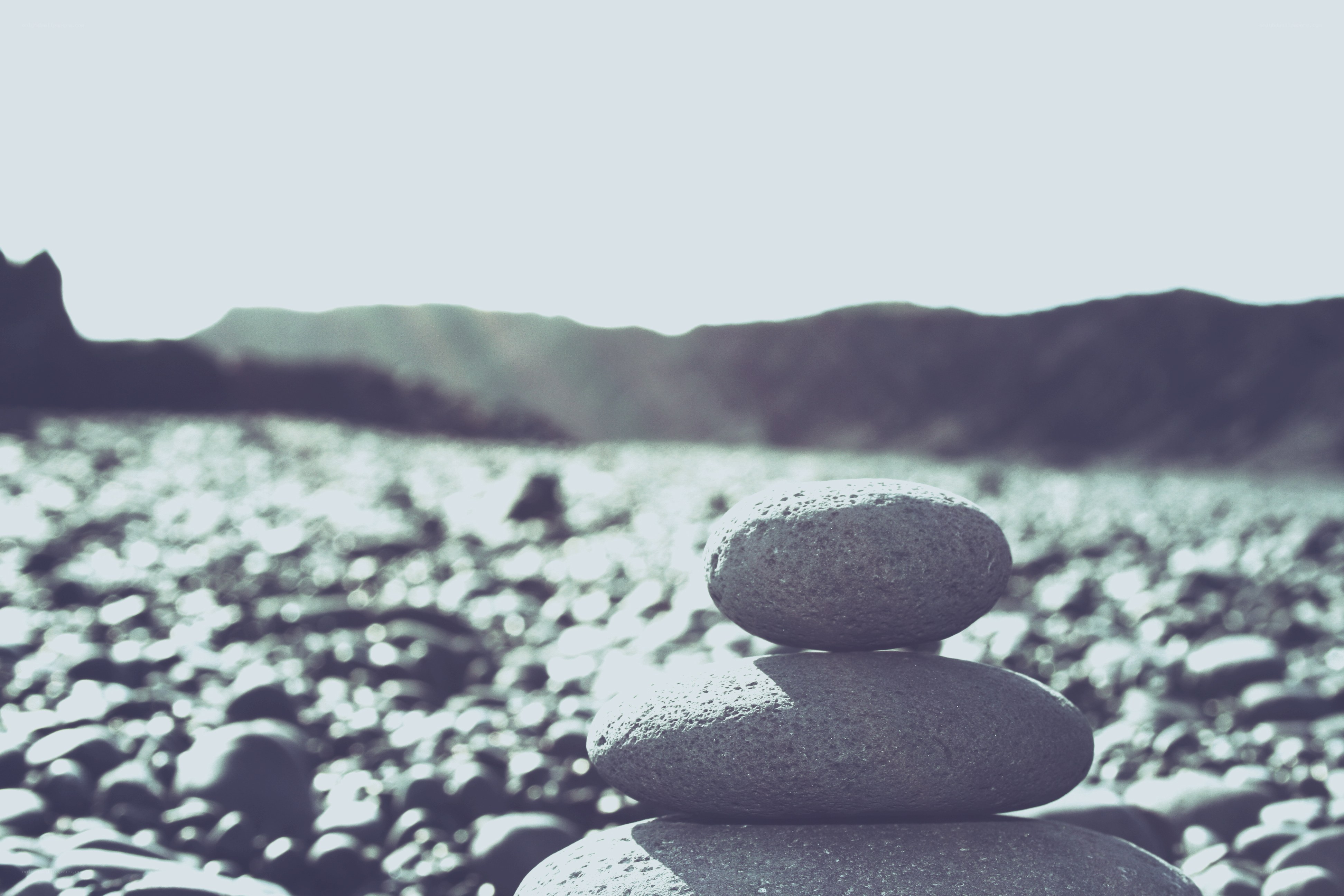 Stacked stones on a pebble beach