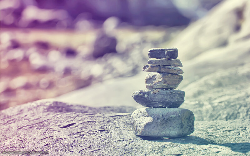 Stacked stones on a rock
