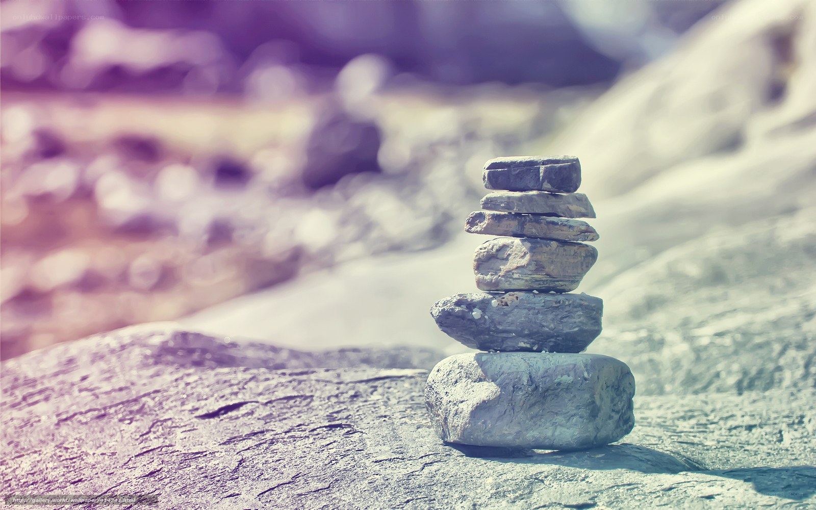 Stacked stones on a rock