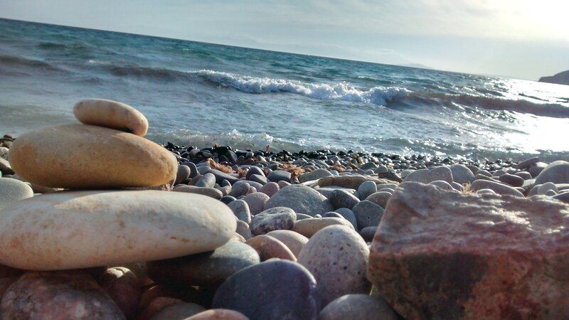 Stacked Stones on Beach — Blue, Calm, Afternoon