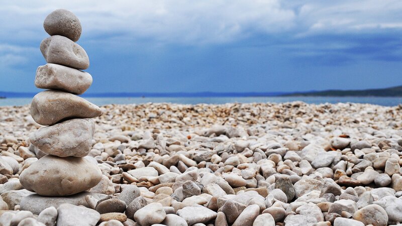 Stacked Stones on Beach — Blue, Serene, Afternoon, Photograph, Pebbles, Sea