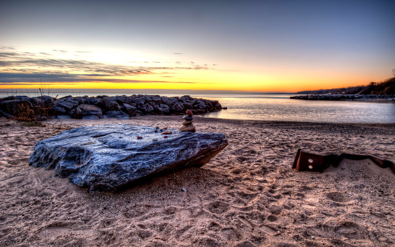 Stacked Stones on Beach — Orange